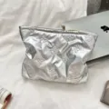 Metallic silver quilted makeup pouch with embossed patterns for daily essentials - Bowknot Silver
