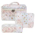 Three-piece floral quilted cotton makeup bag set for travel storage in light blue - Bee Patchwork