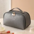 Graue Kosmetiktasche mit Webstruktur, großes Fassungsvermögen und Goldzipper - Spacegrau