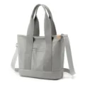 Gray minimalist canvas tote bag with large capacity and an adjustable crossbody strap. - Crossbody Style / Gray / L