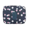 Dark blue waterproof storage bag for toiletries with a pink and white floral pattern - Navy Floral