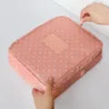 Pink polka dot waterproof travel cosmetic bag with large capacity and zippered storage - Pink Polka Dots