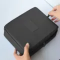Black large capacity waterproof travel cosmetic bag with double zipper. - Black