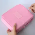 Large capacity pink waterproof travel makeup and toiletry storage bag with zipper closure - Pink