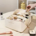 Large cream waterproof travel makeup organizer bag with multiple compartments. - Organ Pillow Cream White 【Extra Large] / Customizable Logo