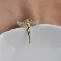 Detailed view of a golden angel lapel pin with sparkling crystal wings and polished body - Angel Style (Style 01) / Gold