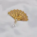 Exquisite gold-plated Chinese fan brooch with a teardrop pearl pendant on silk fabric - Hook Style