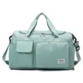 Waterproof mint green sports gym duffel bag with a dedicated shoe compartment and strap - Green