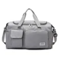 Grey fitness travel bag with multiple pockets and shoulder strap for gym and sports - Gray