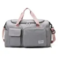 Water-resistant grey sports gym bag with pink handles and multiple storage pockets - Pink and Grey