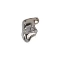 Detailed macro shot of a vintage silver mask brooch with a high-polish finish - Silver