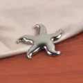 High-quality silver metallic starfish brooch pin for elegant fashion accessories - Large Starfish / Silver