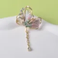 Eleganter goldener Schmetterlings-Brosche mit rosa Flügeln und glitzernden Strasssteinen - Stil 03 Lila Quasten Schmetterling
