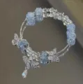 New Chinese style multi-layer bracelet with blue cracked beads and cute silver butterfly charms. - Forest Butterfly Bracelet (S6235) / Light Blue
