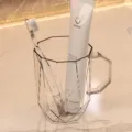 Transparante geometrisch gefaseerde tandenborstelbeker met handvat, moderne mondwaterbeker voor badkamer. - Transparant
