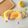 Cute fuzzy plush sleep mask with funny eyes and braids, soft winter eye shade for women - Funny Face Yellow