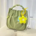 Bolsa cosmética verde nube con dije de flor amarilla, gran capacidad organizador de viaje. - Colgante de Flor Amarilla / Verde Fruta