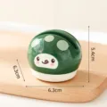 Piccolo affilatore per coltelli a ventosa a fungo utensile da cucina con design carino e misure. - Verde