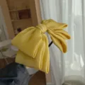 Chic yellow satin oversized bow headband with a slim frame in minimalist Korean style - Yellow