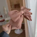 Elegant oversized satin bow headband in dusty pink finish for stylish hair styling and daily wear - Brown