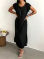 Sleeveless black midi dress for women featuring side slit and loose casual vest design. - XS / Black
