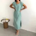 Sleeveless slim-fit midi slip dress with side slit, casual summer wear for women, light green. - Mint Green