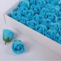Blue soap rose flower heads packaged in a white gift box, perfect for DIY bouquets and Valentine gifts. - 50 Pieces/Box / Medium Blue