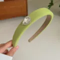 Elegant lime green wide padded headband featuring a large teardrop crystal embellishment - Mustard Teardrop
