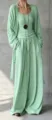 Dettaglio dei pantaloni fluidi a gamba larga e del cardigan abbinato in maglia verde - Taglia S / Top E Pantaloni / Verde chiaro