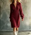 Close-up view of the chic burgundy knit dress featuring a zip collar and stylish long sleeves. - Burgundy