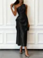 Detail view of the elegant black one-shoulder satin midi dress, highlighting exquisite draped fabric. - XS / Black