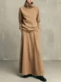 Minimalist turtleneck top and long skirt detail shot, elegant solid color knitwear outfit. - S / Set / Camel