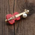 Exquisite gold-plated violin brooch with red enamel, white pearl and iridescent crystals - Red