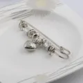 Retro silver safety pin brooch with heart charm and decorative beads for shawls and scarves - Silver