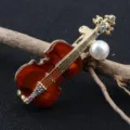 Vintage amber violin shaped brooch pin with white pearl and colorful rhinestones for suits - Brown