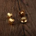 Detail view of four gold-plated metal pin backs for DIY brooch making accessories. - 0.7*1.0CM / Pin Buckle / Gold
