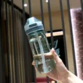 Large capacity plastic water bottle with straw and scale markings for daily use or sports. - 500ml / Green
