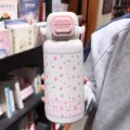 Cute pink floral stainless steel thermos water bottle with strap for student daily use - 700mL / Pink