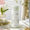 Edelstahl Thermosflasche im süßen Blumen Design für Mädchen und Schule im täglichen Leben. - 480ml / Maiglöckchen