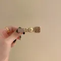 Elegante fermaglio per capelli dorato con farfalla e strass marroni per moda donna - Fiocco Champagne