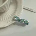 Barrette à cheveux haut de gamme avec strass bleus et étoiles sur fond blanc - Barrette Étoile Strass (Bleu 240417)