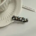 Pince à cheveux élégante en strass vintage avec des accents d'étoiles et de gemmes ambre - Barrette Étoile Strass (Noir 240417)