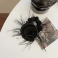 Detail of vintage French black satin rose hair scrunchie with feather accents - Hair Tie / Black