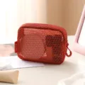 Orange mesh cosmetic bag with zipper, portable transparent makeup pouch for daily use. - Mini Cube Bag / Sunset Orange