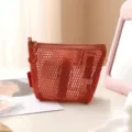 Orange mesh cosmetic bag portable zipper storage pouch for makeup, stationery and cables. - Triangle Bag / Sunset Orange