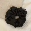 Elegant black satin scrunchie with delicate lace trim for women's hair styling - Lace Trim / L / Black