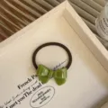 Elegante groene haarelastiek met acetaat strik voor de haarstyling van vrouwen - Groen