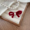 Elegant red velvet bow hair clip with a white pearl center for charming hair styling - Red-Large (240104)