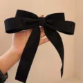 Large black glitter bow hair clip for elegant and sweet hairstyles, oversized design. - Long Glitter Black / Black