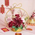 Gold iron flower basket artificial flower detail featuring red roses and berries for New Year decor. - HJ005 - Living in Peace